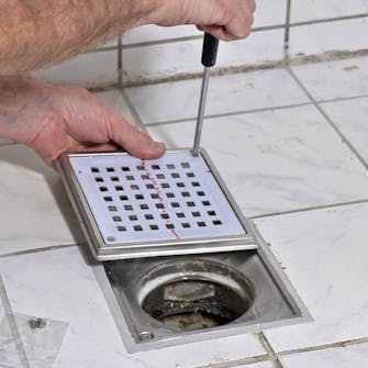 Bytte slukrist selv: Adskill rist og ramme Bytte slukrist selv: Adskill rist og ramme